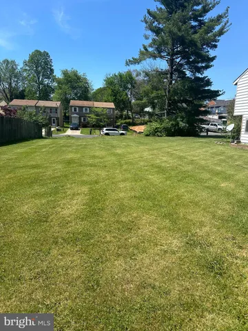 a view of a house with a big yard