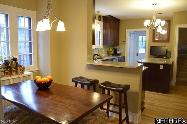 3003 Eaton Road Shaker Heights, OH 44122 - Photo 9 of 25 Eating area of kitchen with breakfast bar area and center island.