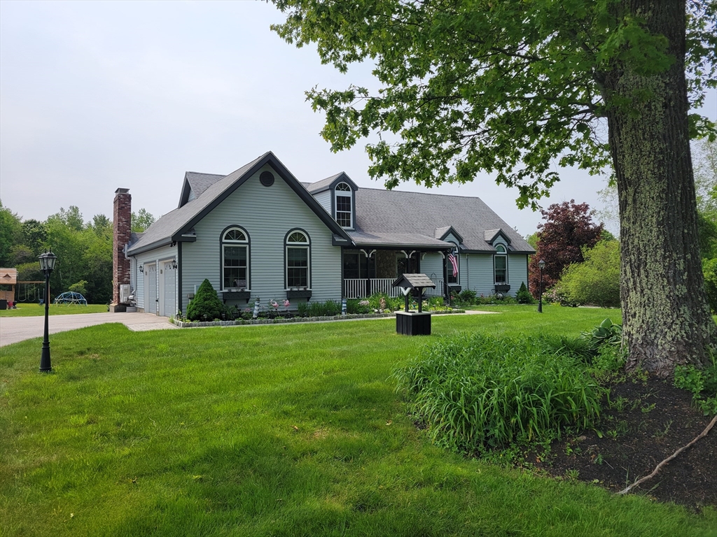 110 Hosley Road Gardner, MA 01440 - Photo 1 of 42 a front view of house with yard and green space