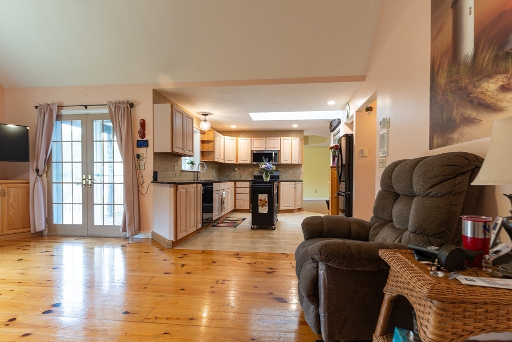 110 Hosley Road Gardner, MA 01440 - Photo 11 of 42 a living room with furniture and kitchen view
