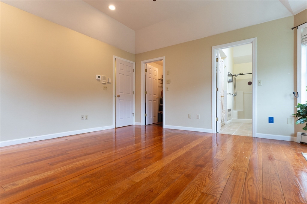110 Hosley Road Gardner, MA 01440 - Photo 18 of 42 wooden floor in an empty room with a window