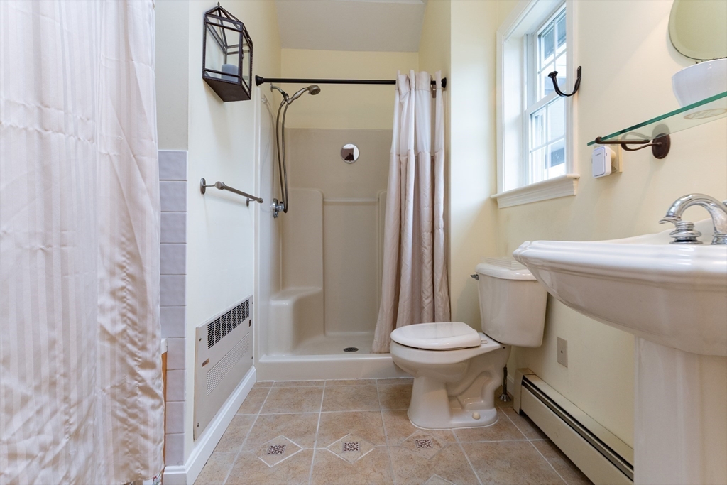 110 Hosley Road Gardner, MA 01440 - Photo 19 of 42 a bathroom with a sink toilet and shower
