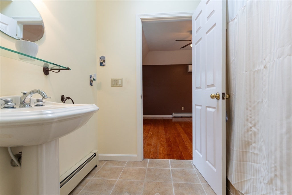 110 Hosley Road Gardner, MA 01440 - Photo 20 of 42 a bathroom with a sink and a mirror