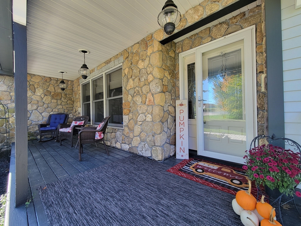 110 Hosley Road Gardner, MA 01440 - Photo 2 of 42 a living room with furniture and a potted plant