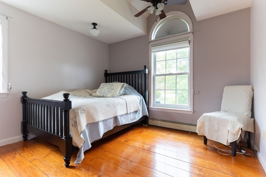 110 Hosley Road Gardner, MA 01440 - Photo 21 of 42 a bedroom with a bed chair and a window