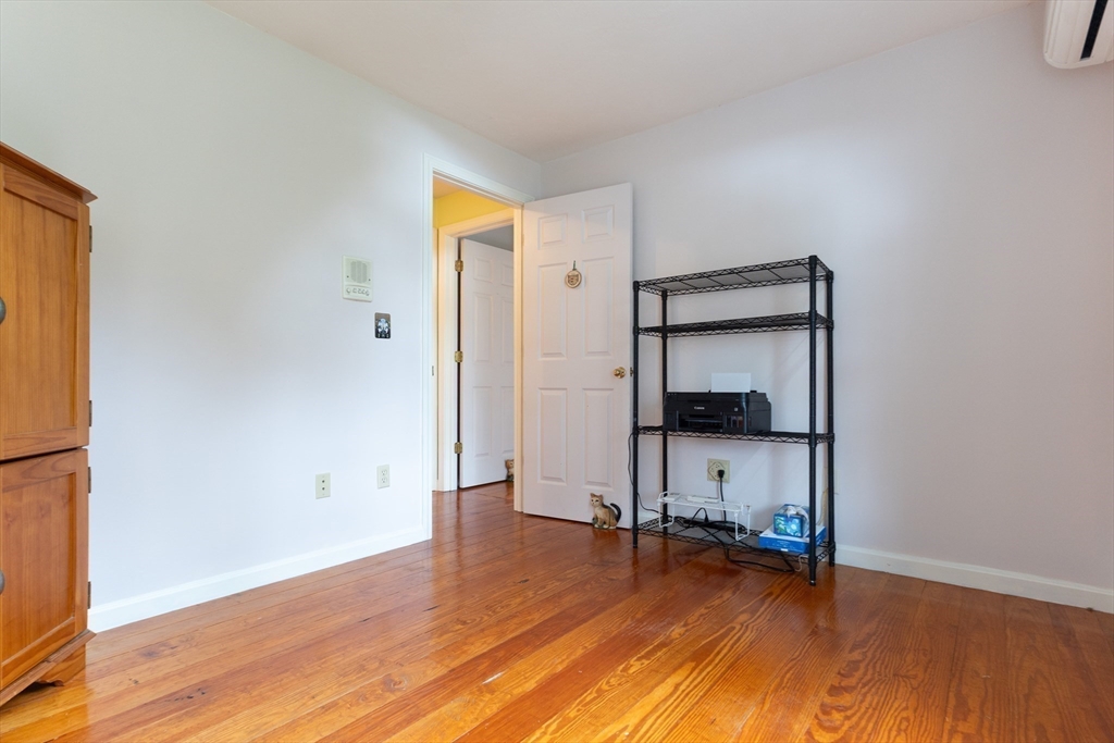 110 Hosley Road Gardner, MA 01440 - Photo 24 of 42 a view of a room with wooden floor and a bathroom