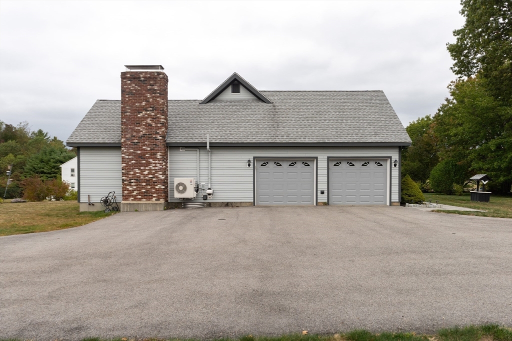 110 Hosley Road Gardner, MA 01440 - Photo 35 of 42 front view of a house with a yard