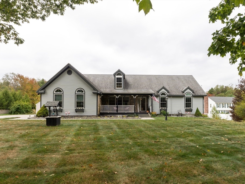 110 Hosley Road Gardner, MA 01440 - Photo 38 of 42 a view of a house with a yard