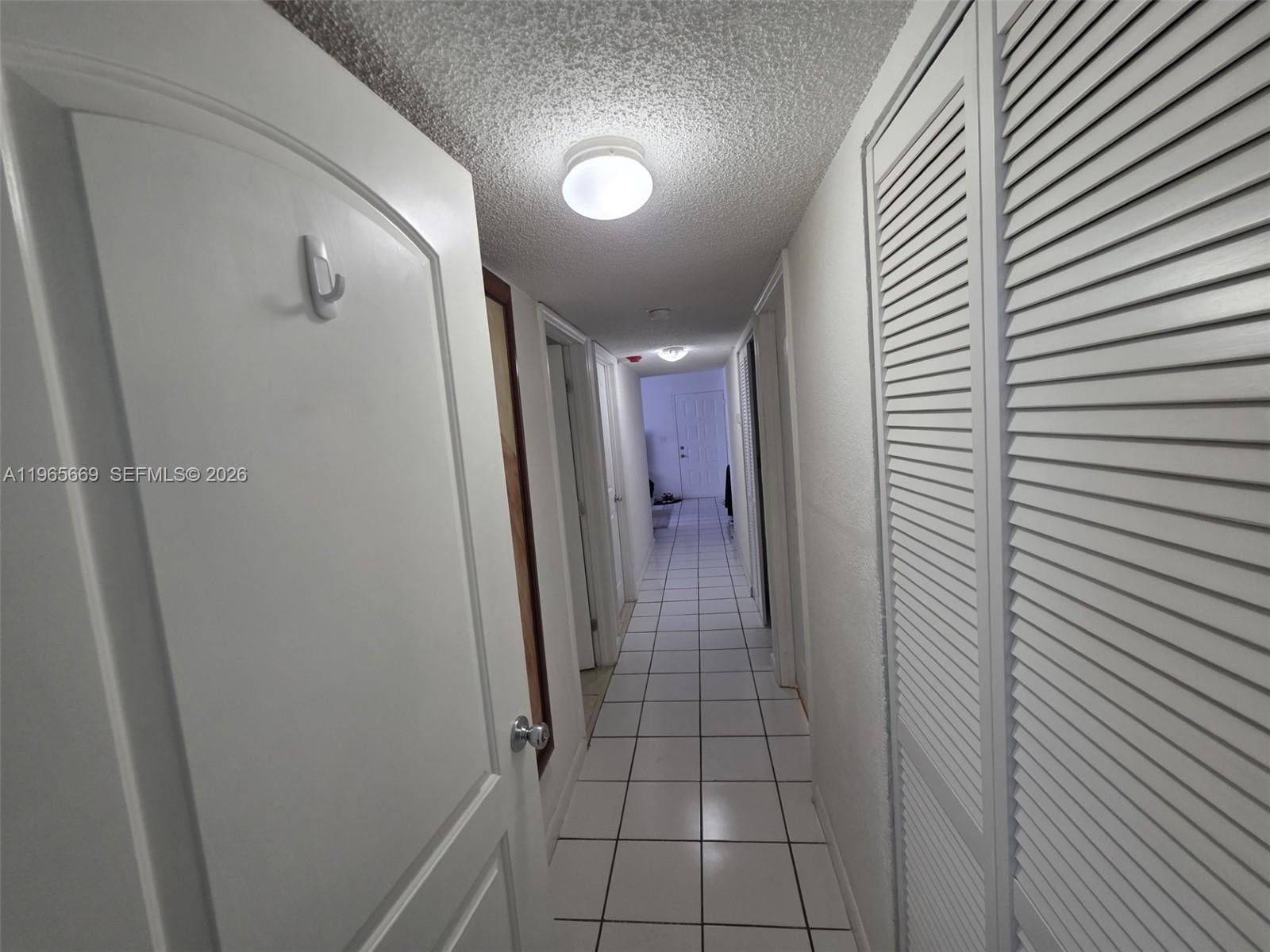 7421 Southwest 152nd Avenue, Unit 9101 Miami, FL 33193 - Photo 28 of 32 a view of hallway