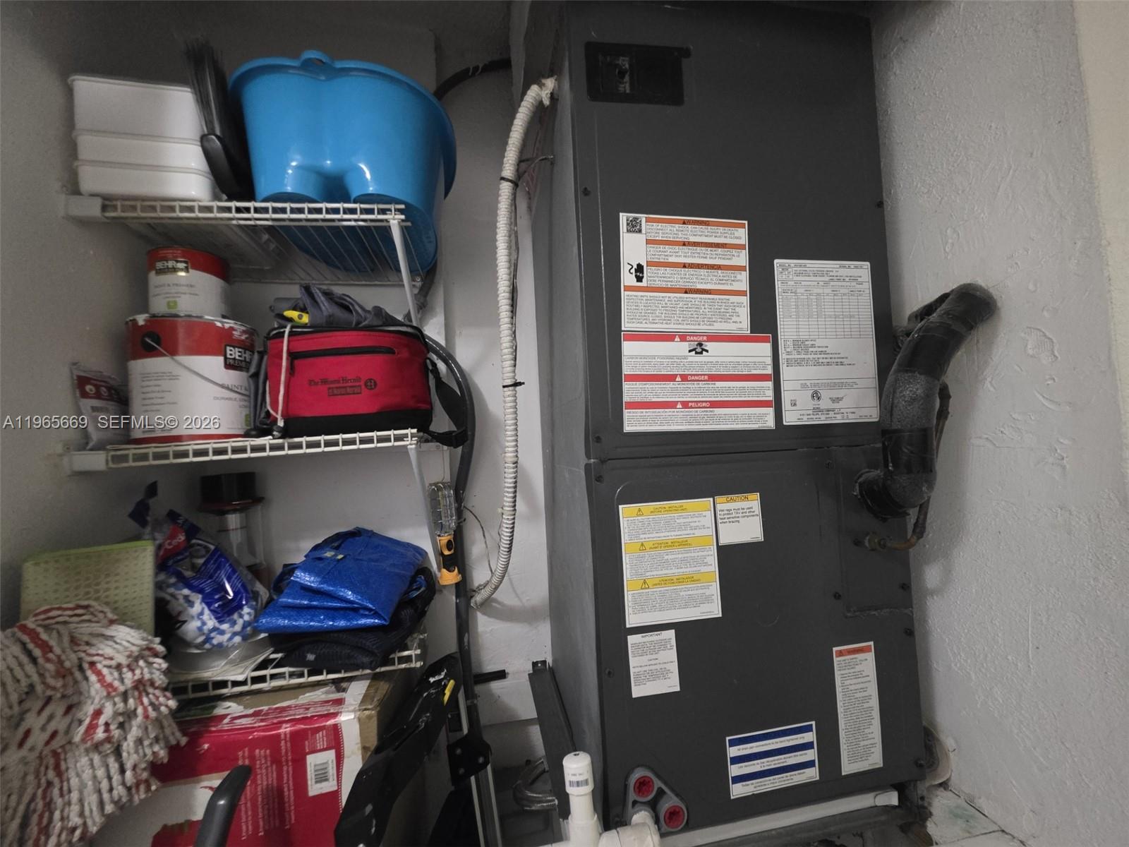 7421 Southwest 152nd Avenue, Unit 9101 Miami, FL 33193 - Photo 30 of 32 a view of storage and utility room