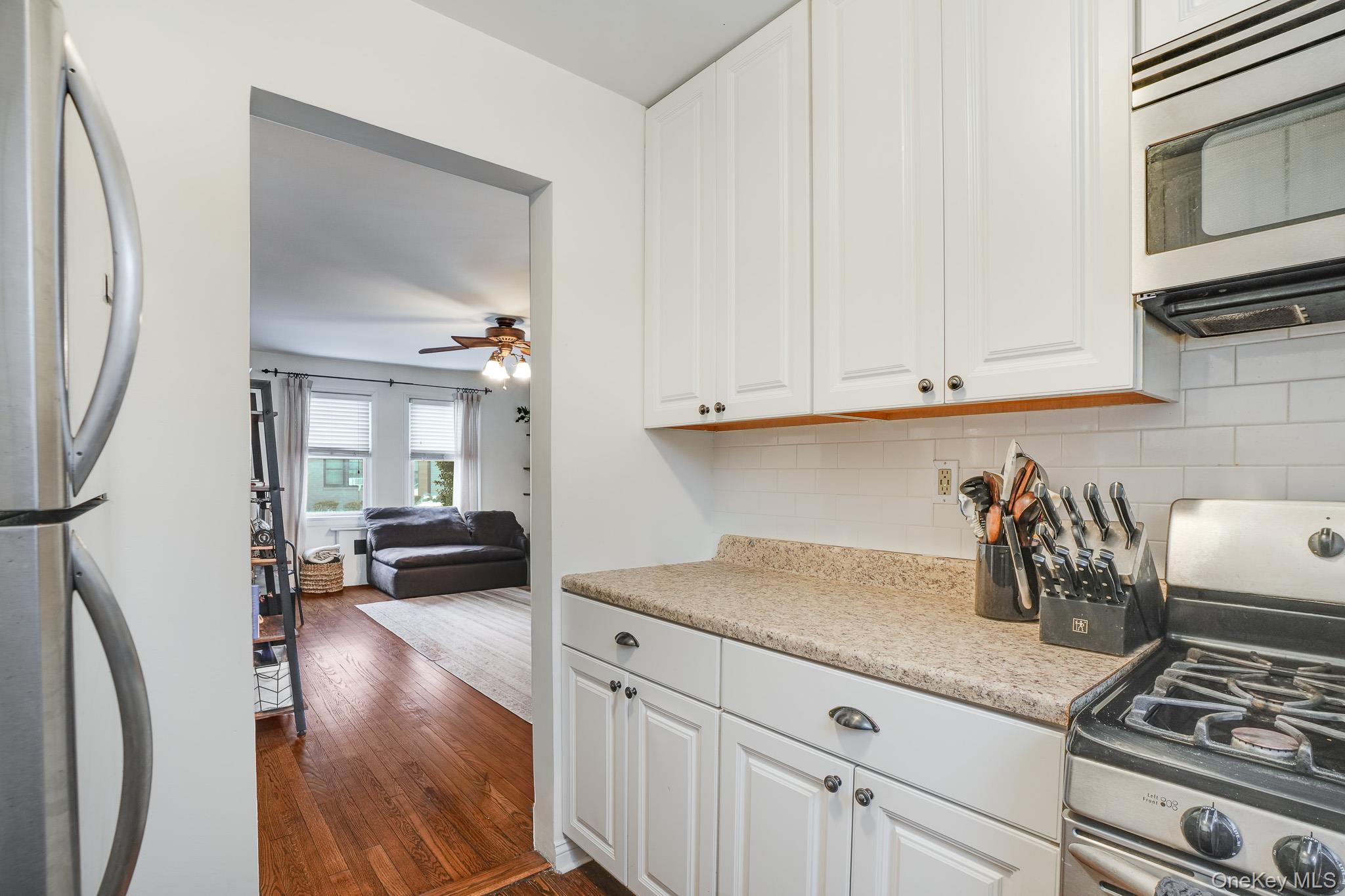 10 Tappan Landing Road, Unit 53A Tarrytown, NY 10591 - Photo 19 of 20 a kitchen with sink and cabinets