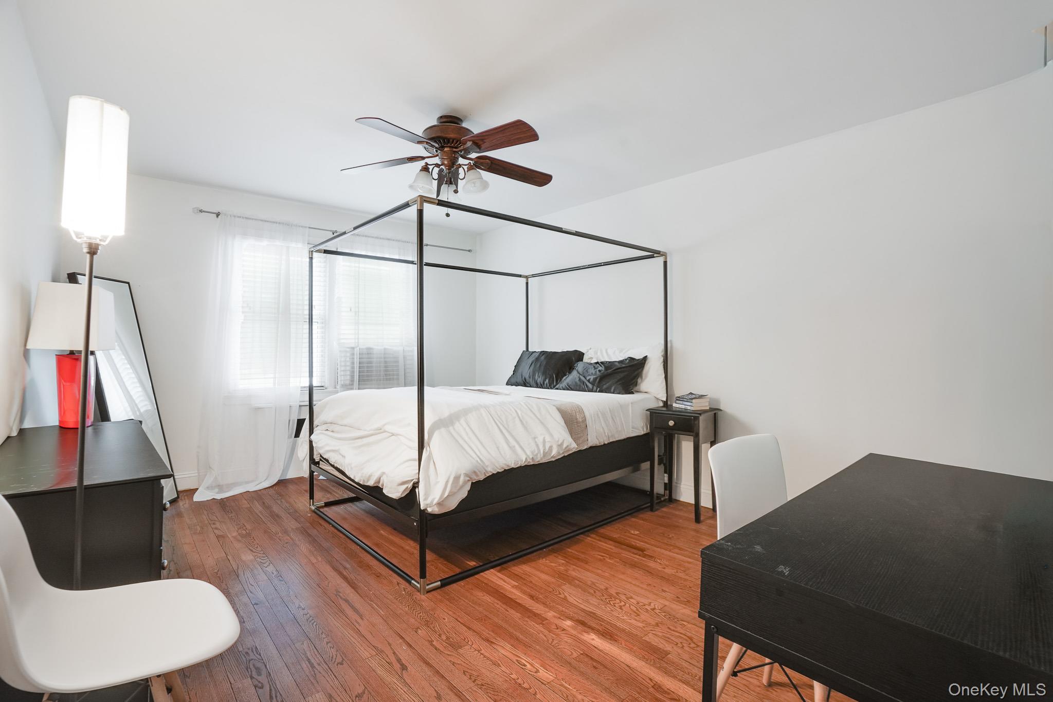 10 Tappan Landing Road, Unit 53A Tarrytown, NY 10591 - Photo 14 of 20 a bed room with a bed and a television