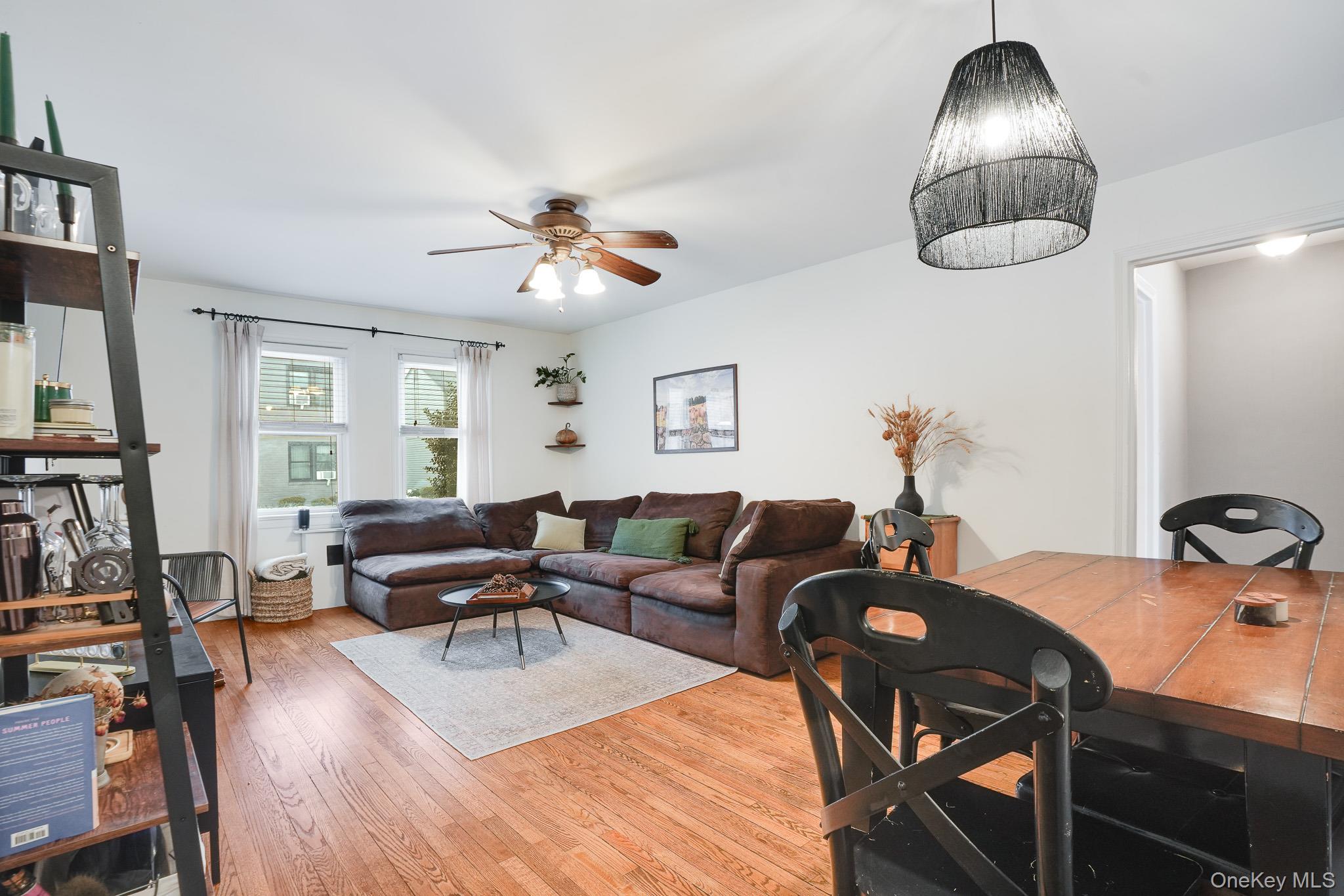 10 Tappan Landing Road, Unit 53A Tarrytown, NY 10591 - Photo 7 of 20 a living room with furniture and a wooden floor
