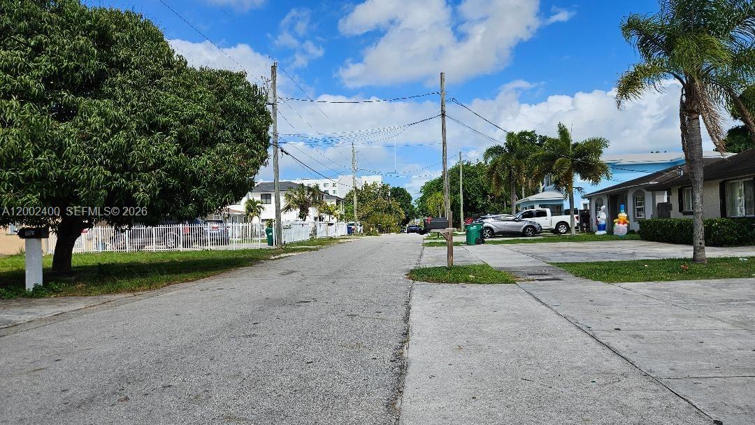 11970 Southwest 217th Street, Unit 11970 Miami, FL 33170 - Photo 12 of 13 a view of a park with plants and trees