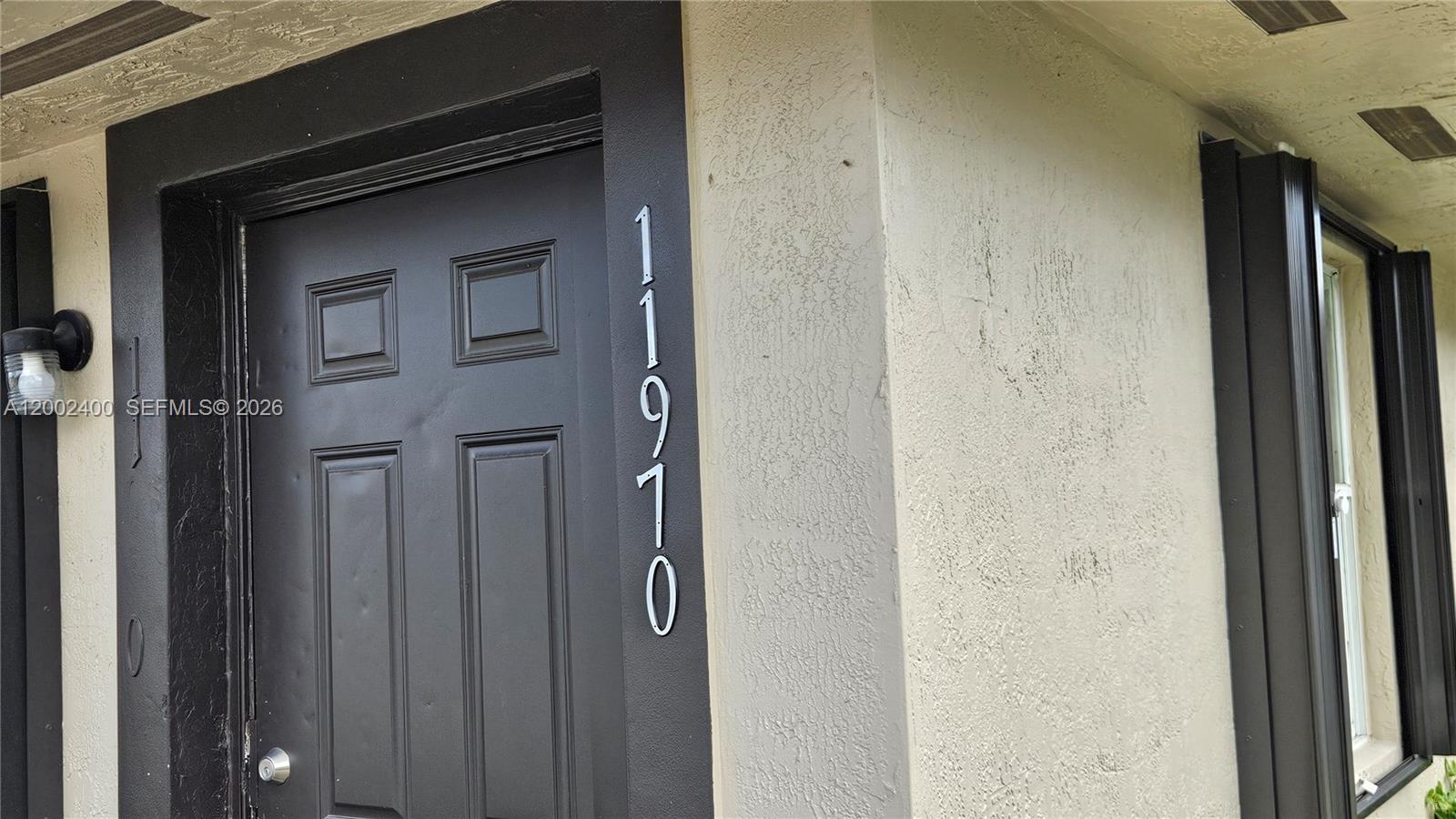 11970 Southwest 217th Street, Unit 11970 Miami, FL 33170 - Photo 2 of 13 a view of front door