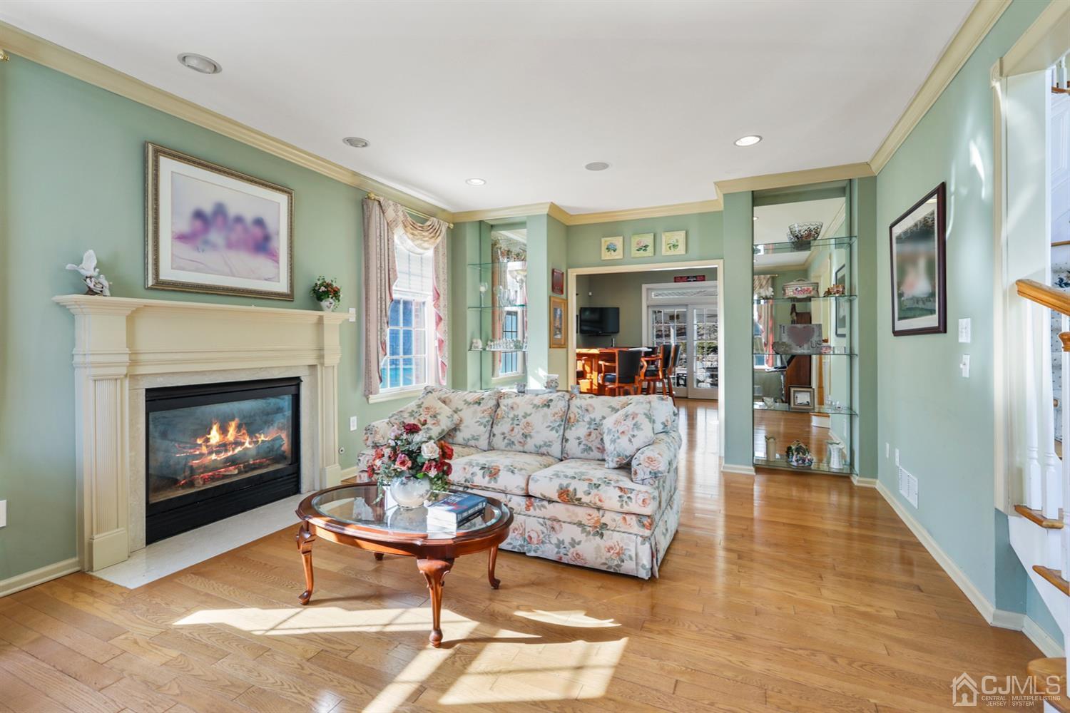 102 Bennett Road Old Bridge, NJ 07747 - Photo 11 of 33 a living room with furniture and a fireplace