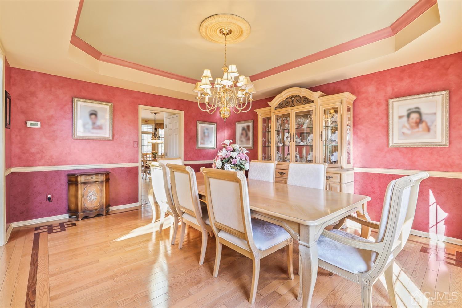 102 Bennett Road Old Bridge, NJ 07747 - Photo 4 of 33 a view of a dining room with furniture and chandelier