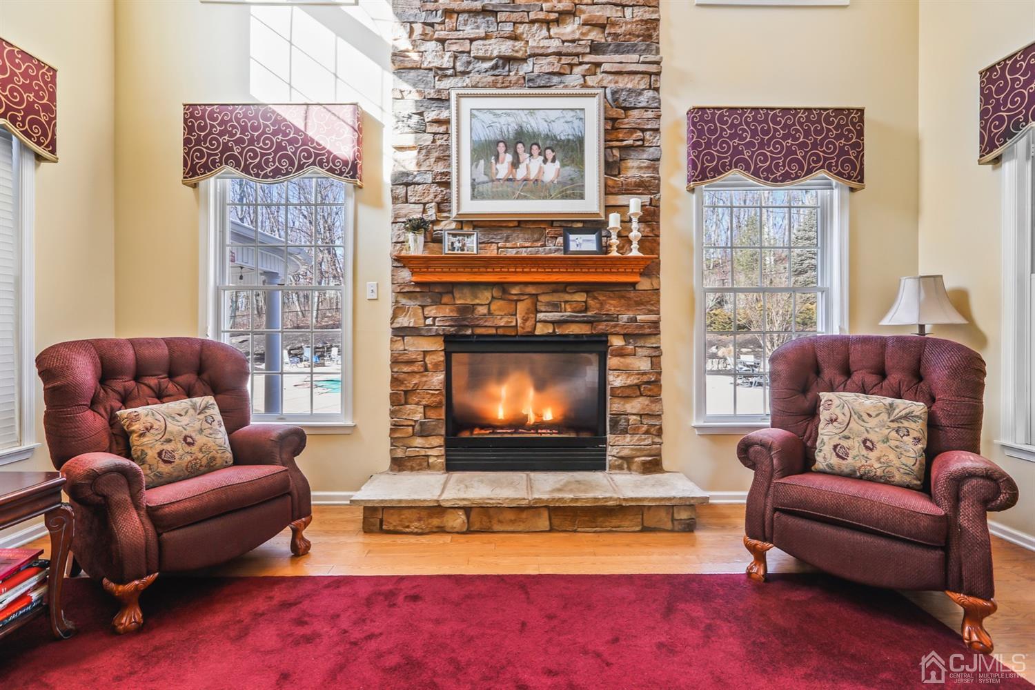 102 Bennett Road Old Bridge, NJ 07747 - Photo 10 of 33 a living room with furniture and a fireplace