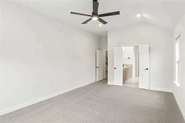 a bathroom with double sink and a mirror