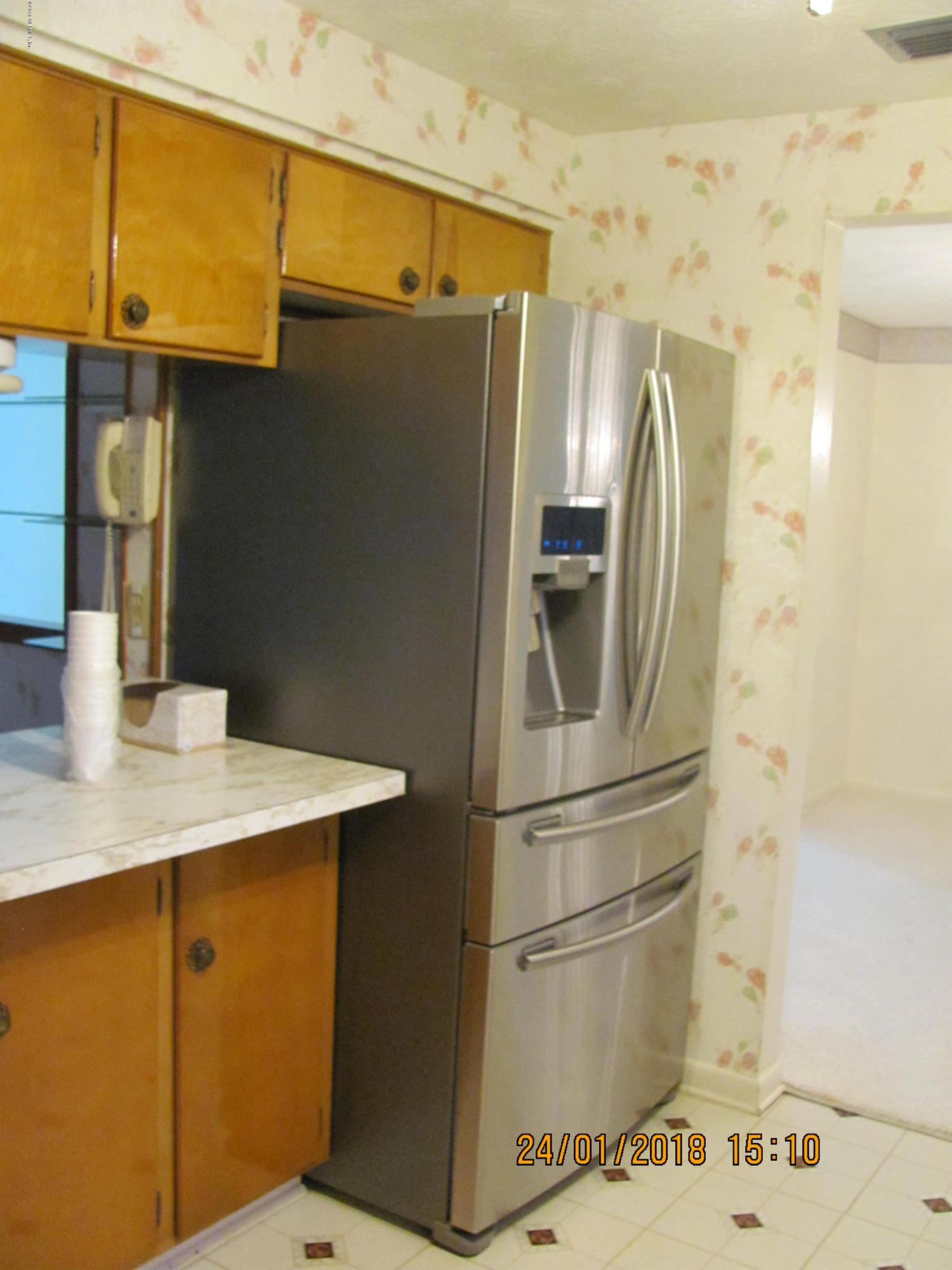 417 Sigsbee Road Orange Park, FL 32073 - Photo 3 of 21 a kitchen with stainless steel appliances granite countertop a refrigerator and a sink