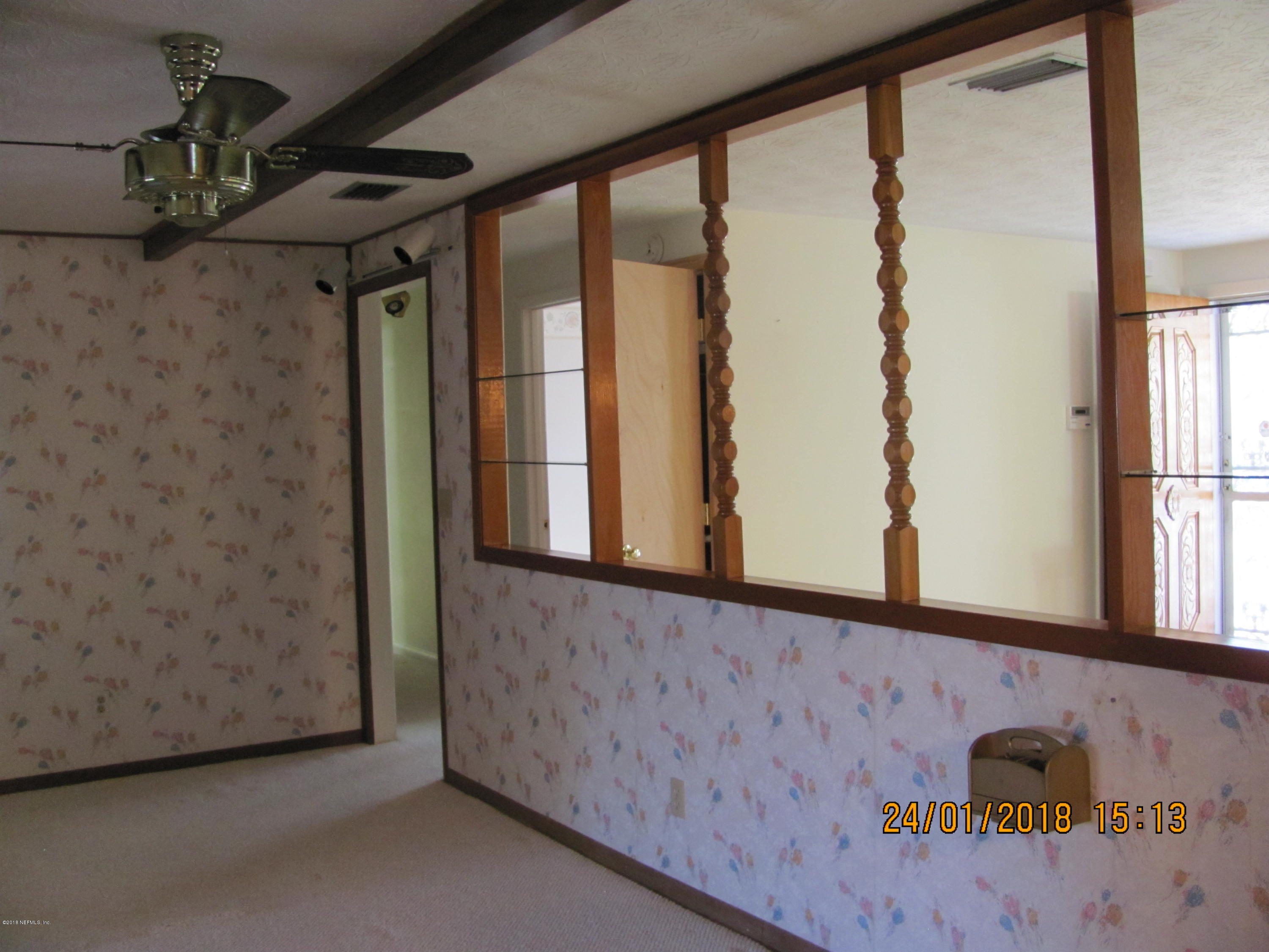 417 Sigsbee Road Orange Park, FL 32073 - Photo 9 of 21 a view of a door and a window