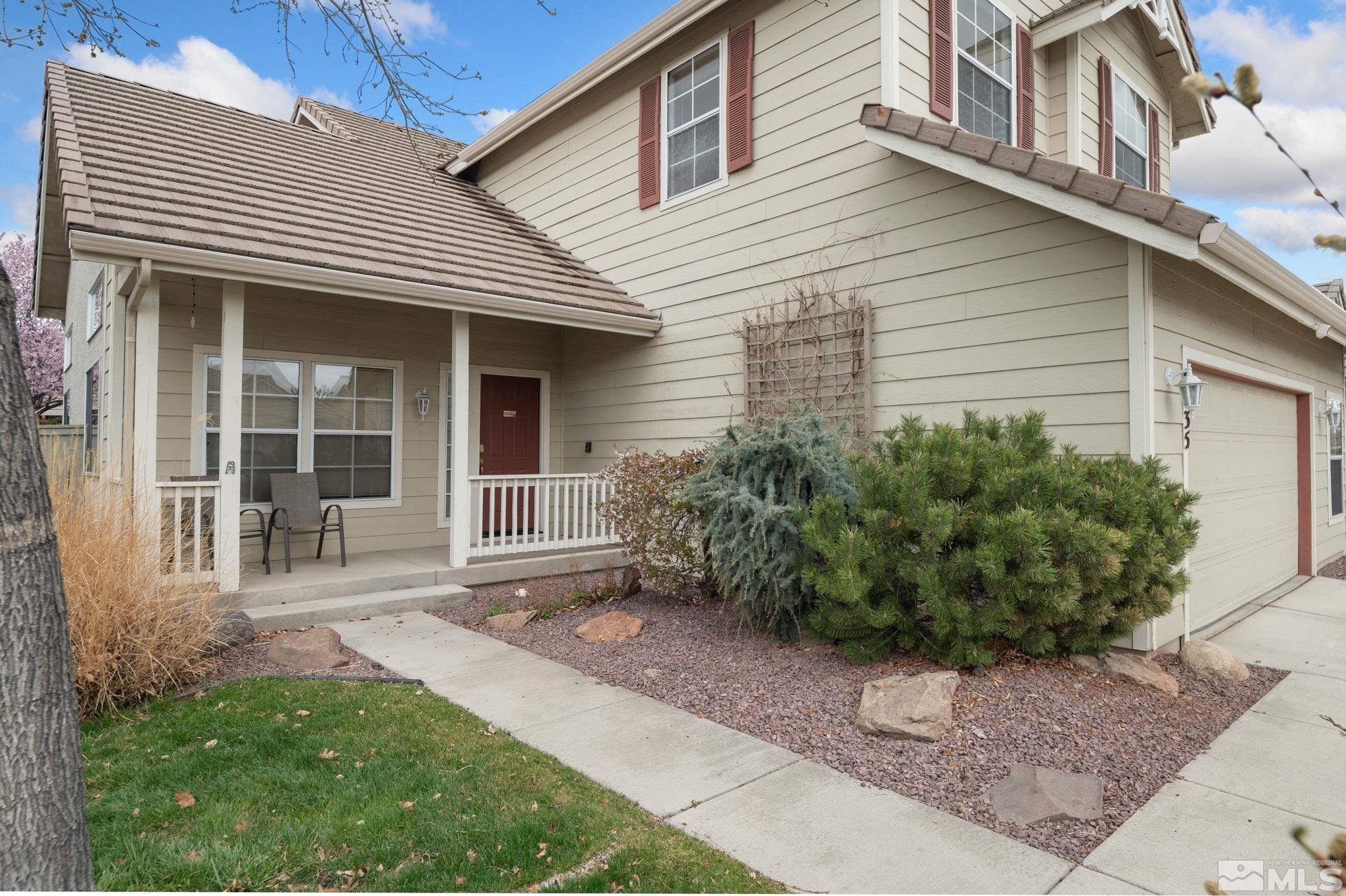 9635 Oakley Lane Reno, NV 89521 - Photo 5 of 40 a front view of a house with garden