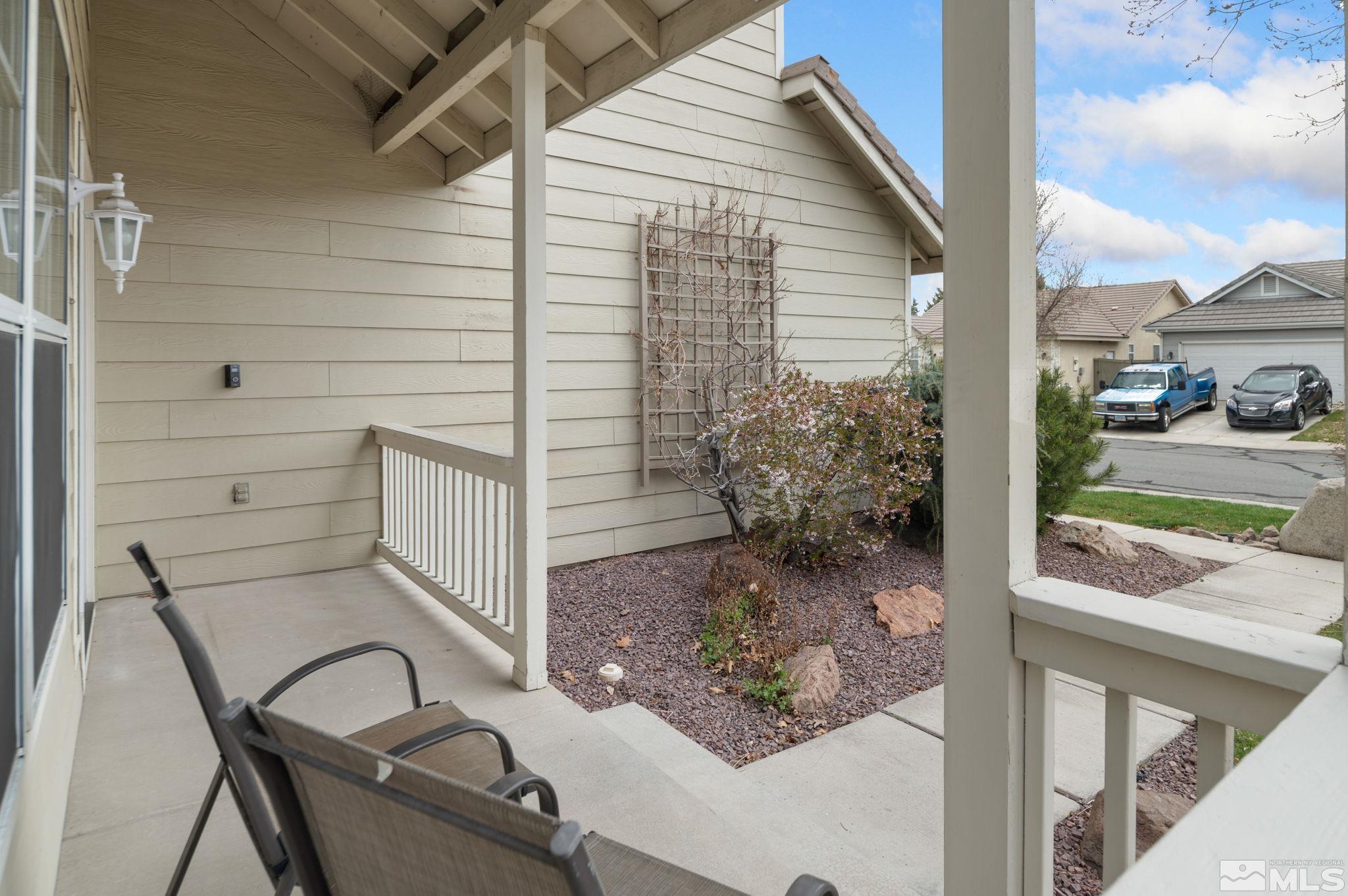 9635 Oakley Lane Reno, NV 89521 - Photo 6 of 40 a backyard of a house with outdoor seating