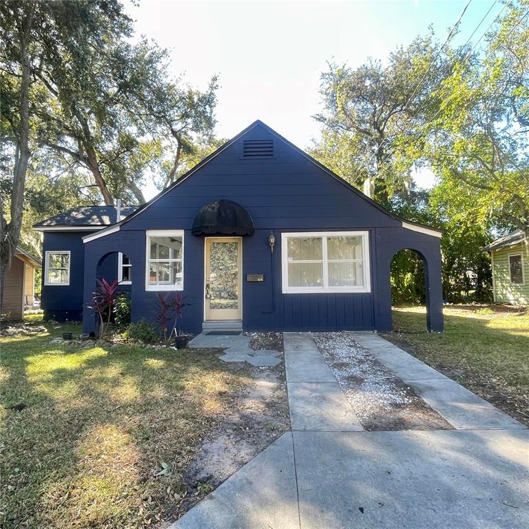 915 East Walnut Street Lakeland, FL 33801 - Photo 2 of 27 a view of a house with a yard