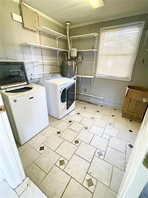 915 East Walnut Street Lakeland, FL 33801 - Photo 24 of 27 a utility room with dryer and washer