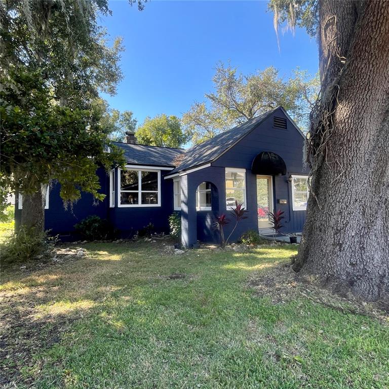 915 East Walnut Street Lakeland, FL 33801 - Photo 3 of 27 a view of house with outdoor space and entertaining space