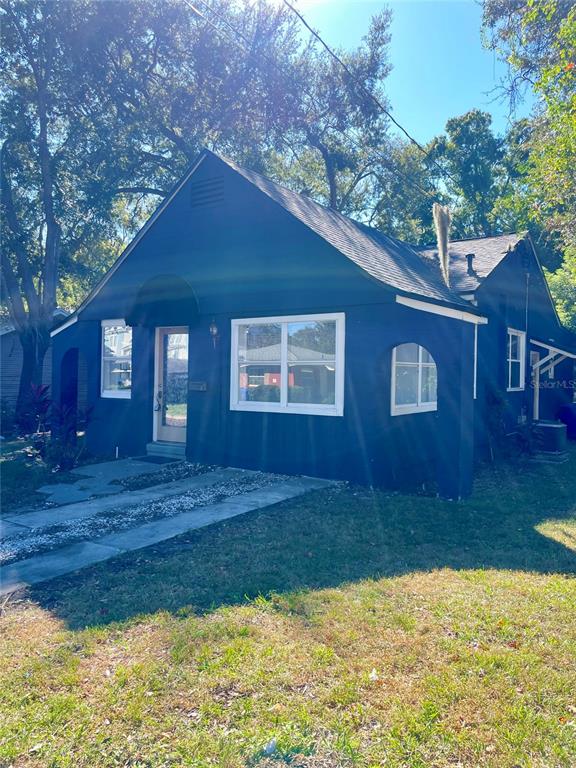 915 East Walnut Street Lakeland, FL 33801 - Photo 4 of 27 a view of a house with a yard