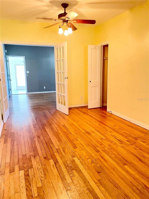 915 East Walnut Street Lakeland, FL 33801 - Photo 10 of 27 a view of a room with wooden floor