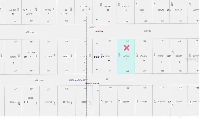 a view of a swimming pool with a yard