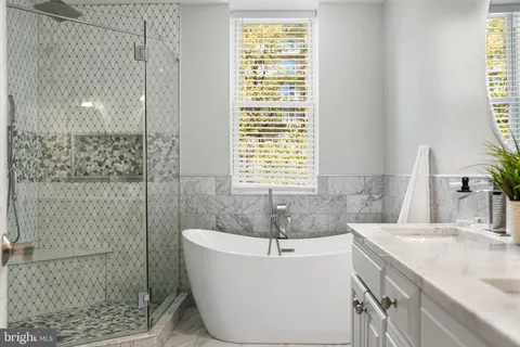 a bedroom with a bed and a table