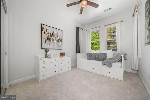 a view of a hallway with washer and dryer