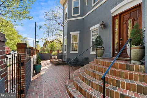 a living room with furniture or couch and a window
