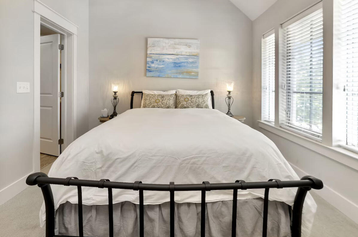 12 Cypress Circle Santa Rosa Beach, FL 32459 - Photo 12 of 33 a large bed sitting in a bedroom next to a window