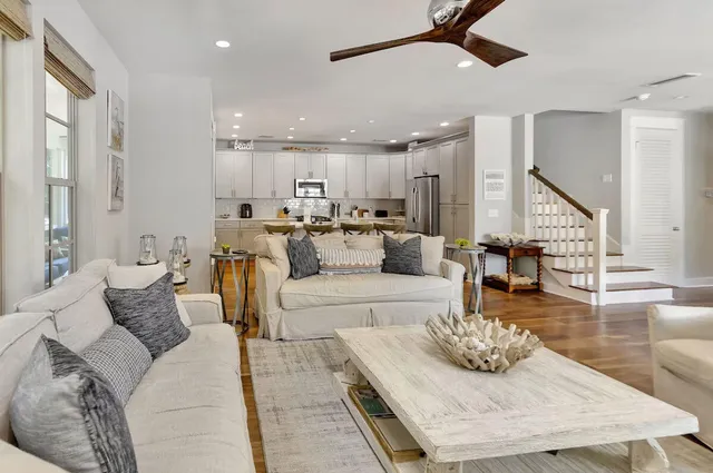 a spacious bedroom with a bed and a flat screen tv