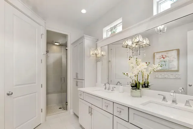 an aerial view of a house with a garden and swimming pool