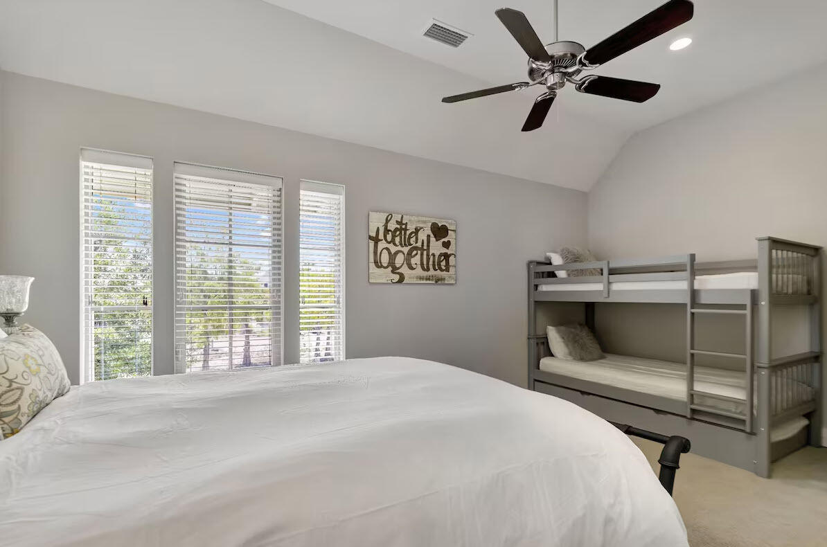 12 Cypress Circle Santa Rosa Beach, FL 32459 - Photo 9 of 33 a bedroom with a bed and a large window