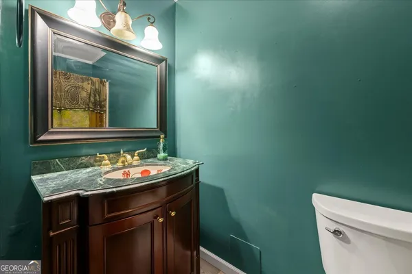 a bathroom with a sink and a toilet