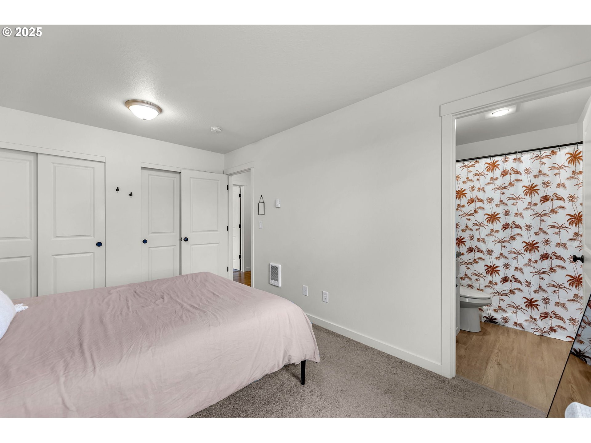 502 Cardinal Avenue Winlock, WA 98596 - Photo 17 of 33 a bedroom with a bed and a painting on the wall