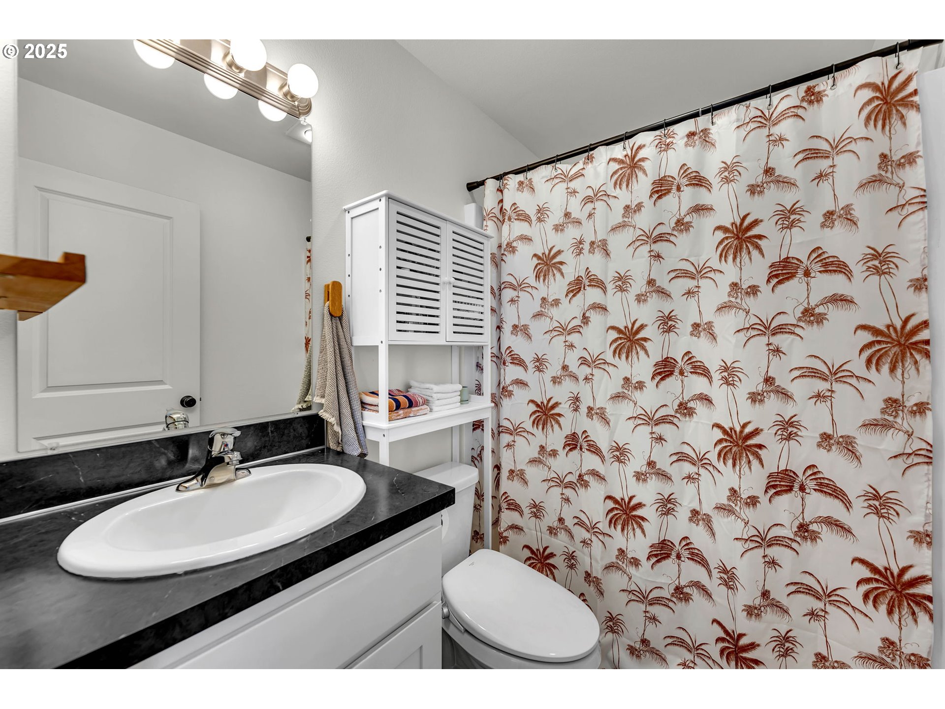 502 Cardinal Avenue Winlock, WA 98596 - Photo 18 of 33 a bathroom with a sink and a mirror