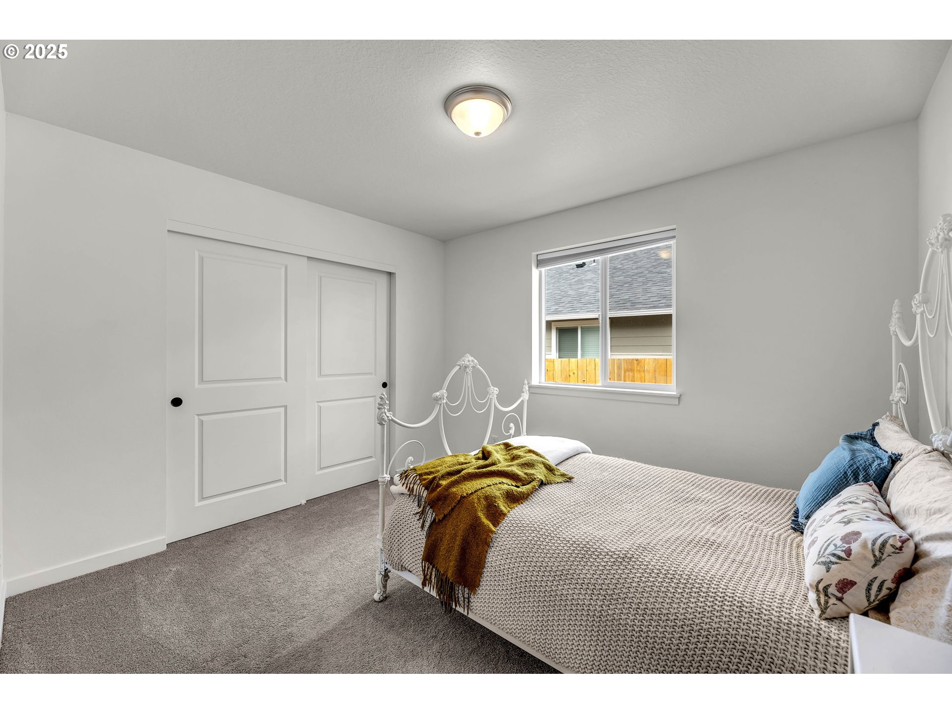 502 Cardinal Avenue Winlock, WA 98596 - Photo 19 of 33 a bedroom with a bed and a window