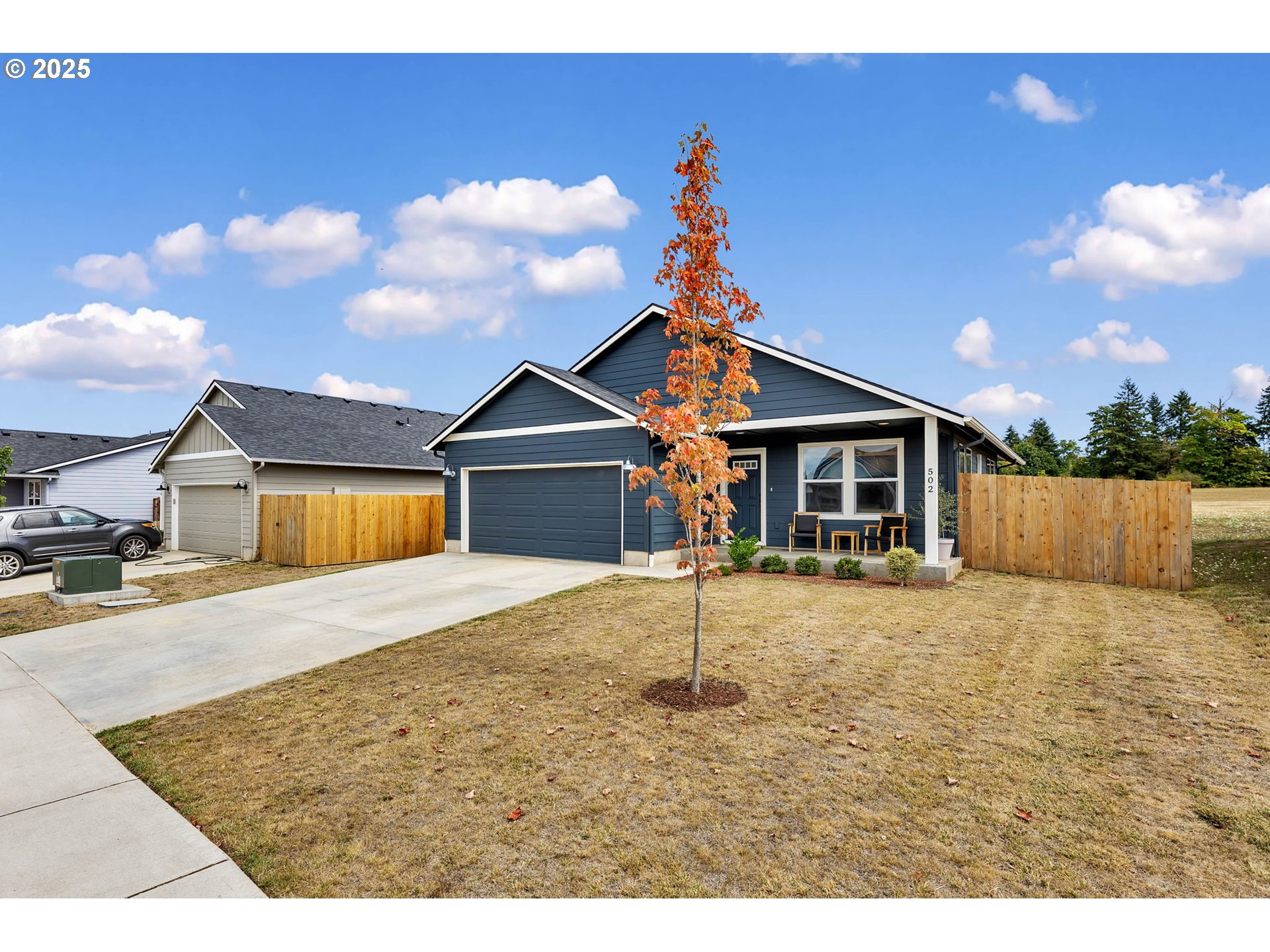 502 Cardinal Avenue Winlock, WA 98596 - Photo 28 of 33 a house view with a backyard space