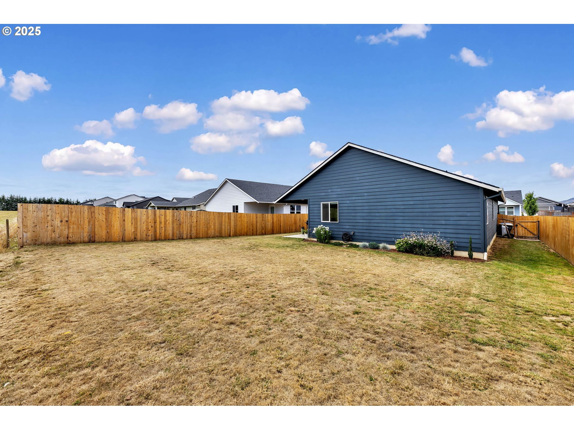 502 Cardinal Avenue Winlock, WA 98596 - Photo 30 of 33 a view of an house with backyard space