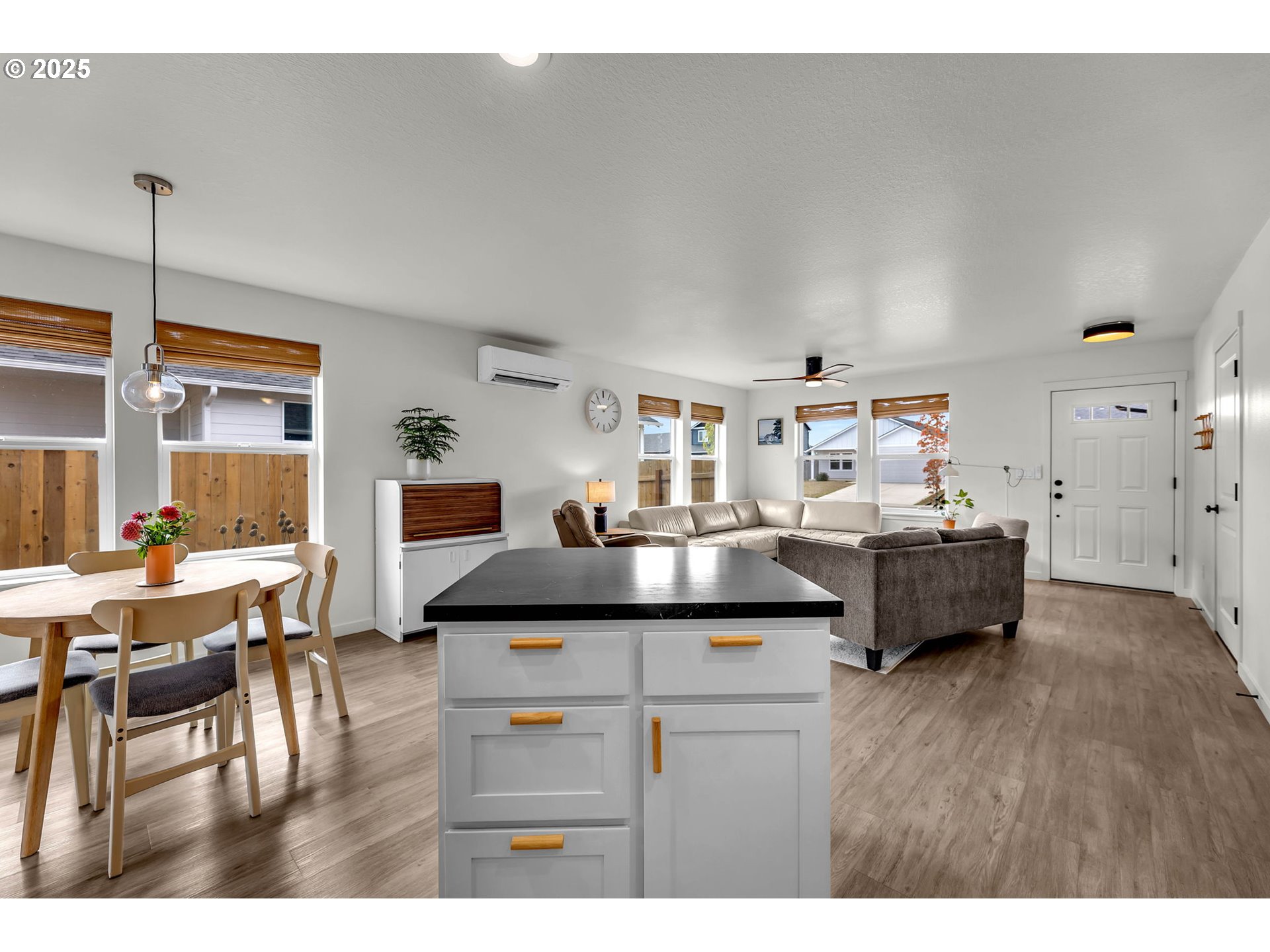 502 Cardinal Avenue Winlock, WA 98596 - Photo 6 of 33 a living room with furniture and a wooden floor