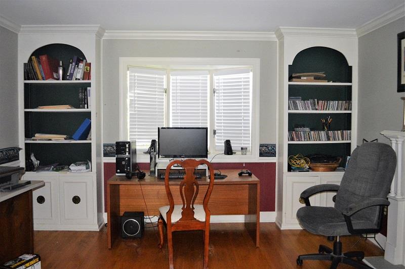 242 Shadowbrook Road Winchester, TN 37398 - Photo 6 of 30 Just off the formal living room is this 14x12 library. Beautiful built in book shelves on each side of the bay window.