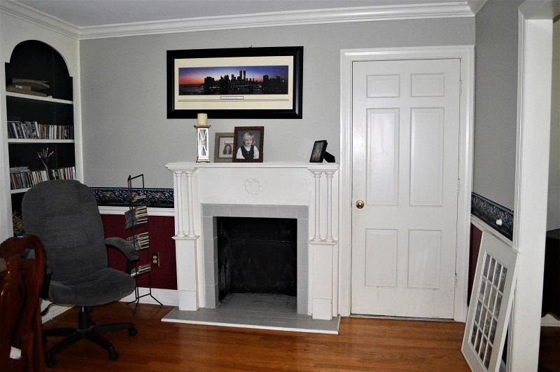 242 Shadowbrook Road Winchester, TN 37398 - Photo 7 of 30 There's a fireplace in the library too.