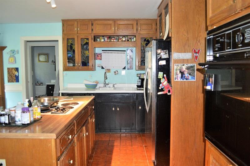 242 Shadowbrook Road Winchester, TN 37398 - Photo 10 of 30 The 15x13 kitchen has loads of custom cabinets and plenty of counter space.